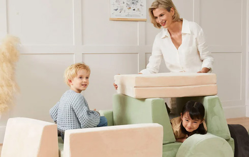 Kids playing with TenderPlay modular play sofa at home